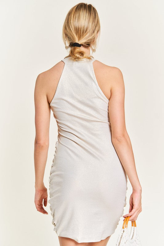 Back view of Jera Shirred Dress in ivory with sleeveless cut and sparkle detail.
