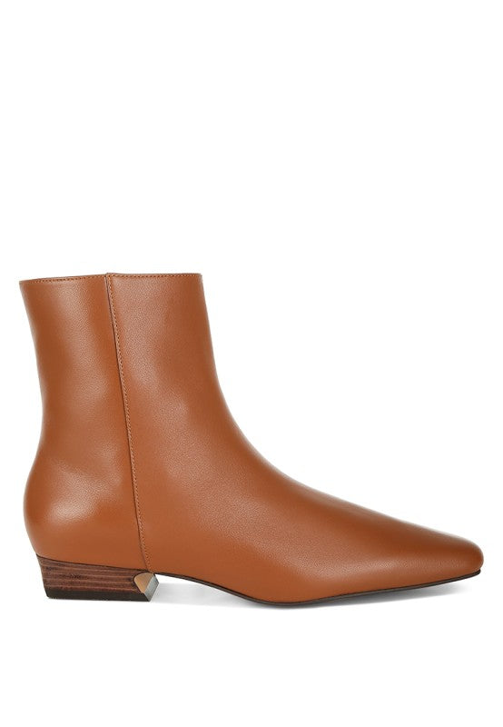 Side view of Obita Leather Ankle Boots in tan highlighting panel detail and flared heel.