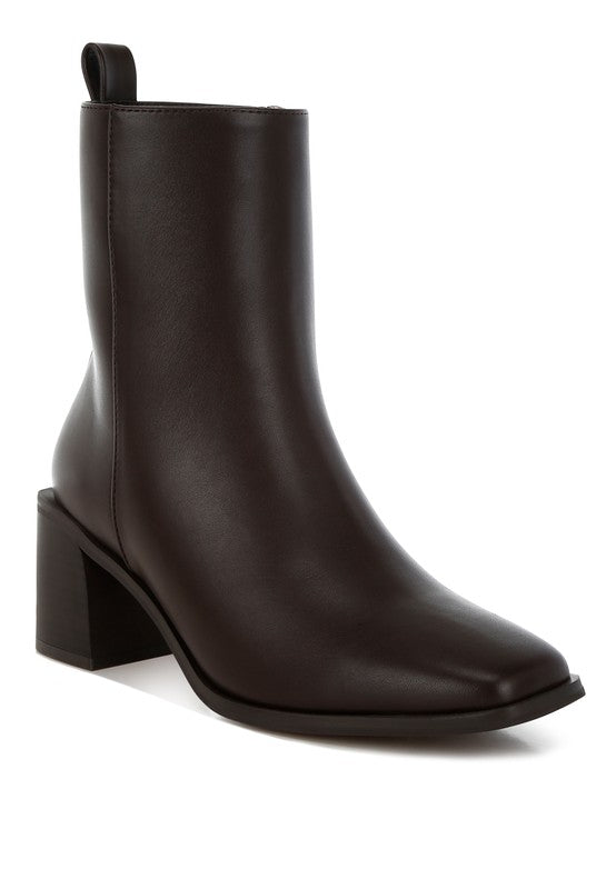 Front angle of Brown Muskox Square Toe Vegan Leather Boots with block heel and zipper closure.
