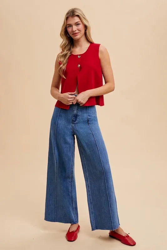 Trendy Lonnie metal button detail cropped sweater vest in red, ideal for layering over tops and dresses.