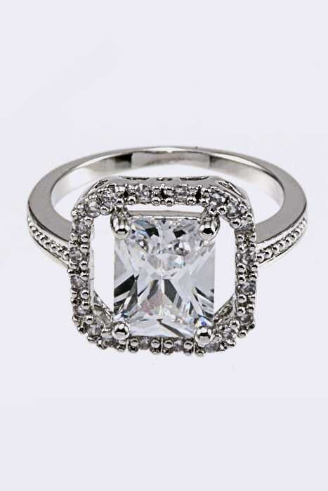 Front view of Elegant Cubic Zirconia Ring featuring brilliant stones on a rhodium-plated brass band.