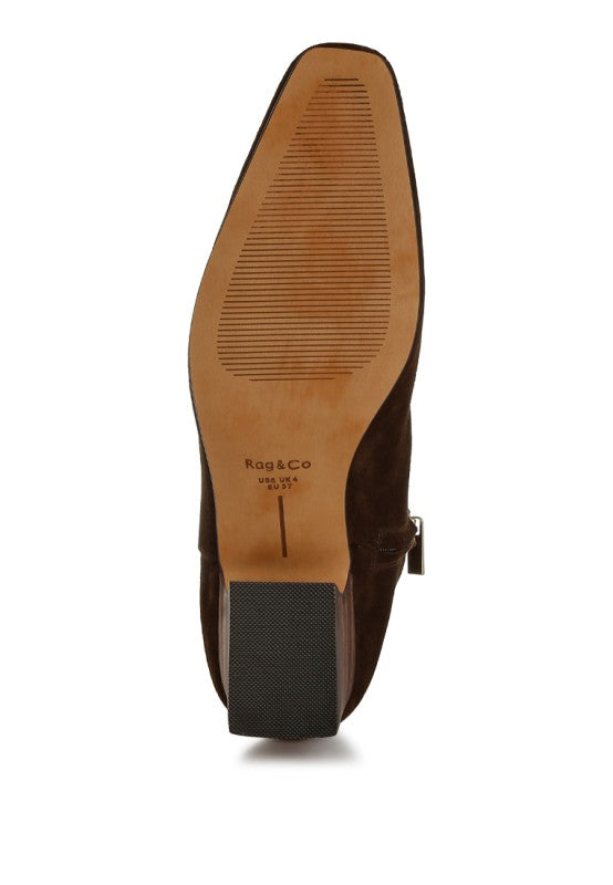 Bottom view of the Hakra suede bootie showing tread pattern and sole detail.