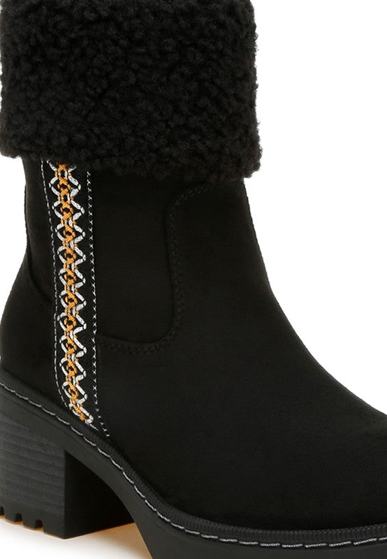 Close-up of Black Woolly Faux Fur Embroidered Boots showing embroidered detail and microfiber finish.