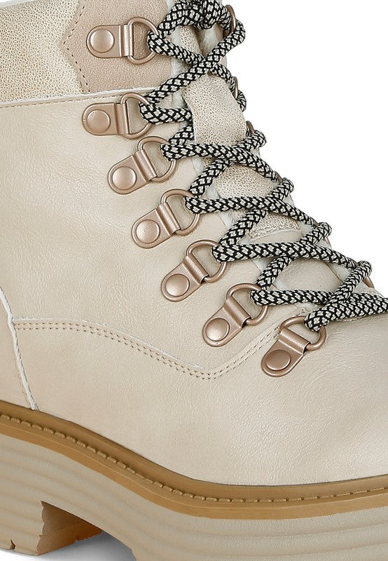 Close-up of Beige Boskoff Lace-Up Chunky Ankle Boots showing vegan leather texture and lace-up detail.