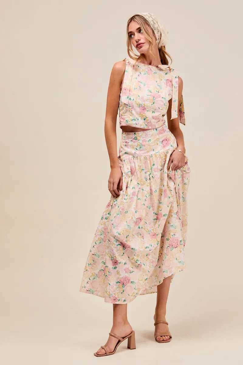 Full body front view of Soraya Floral Two-Piece Set with crop top and pink floral tiered maxi skirt.