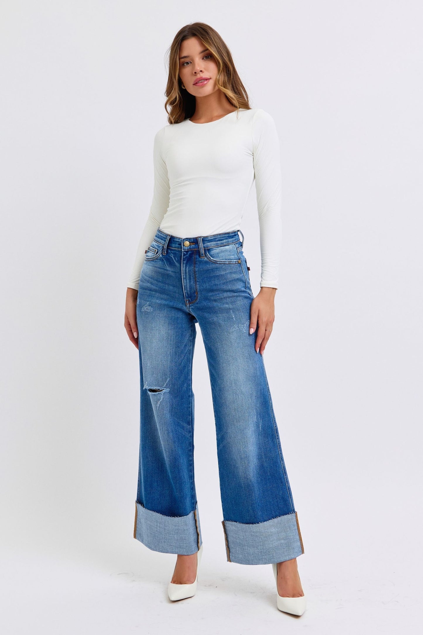 Full body front view of Judy Blue Nare Plus Size Wide Leg Jeans paired with heels.
