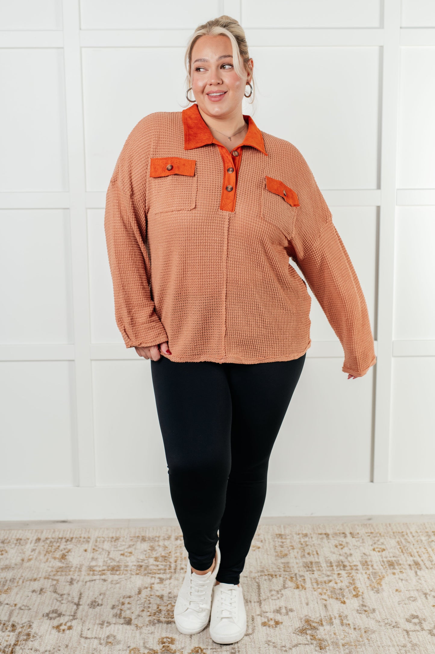 Plus size model in Emerie Waffle Knit Contrast Trim Top paired with leggings.