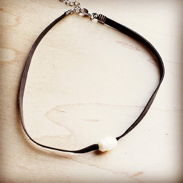Sydney Floating Pearl Leather Choker Necklace with genuine freshwater pearl on brown leather strand, handmade rustic-chic design.