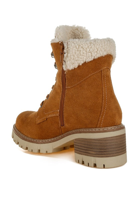 Inside back angle of Tan Madoka Chunky Ankle Boots highlighting side zipper closure and heel.