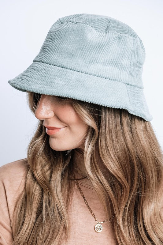 Woman wearing mint Bennet Corduroy Bucket Hat for a fresh, casual vibe.