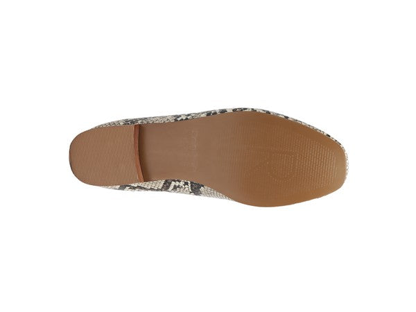 Bottom view of Julia Snakeskin Leather Pointed Loafers with durable sole and flat heel.