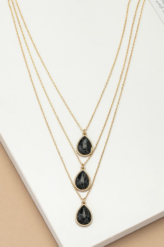 Torina Three Layer Teardrop Stone Pendant Necklace in black with layered chains and small teardrop stone pendant.