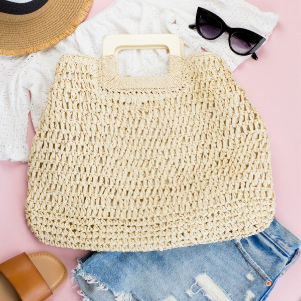 Elinie Oversized Tote highlighting roomy interior, woven texture, and stylish wooden handles.