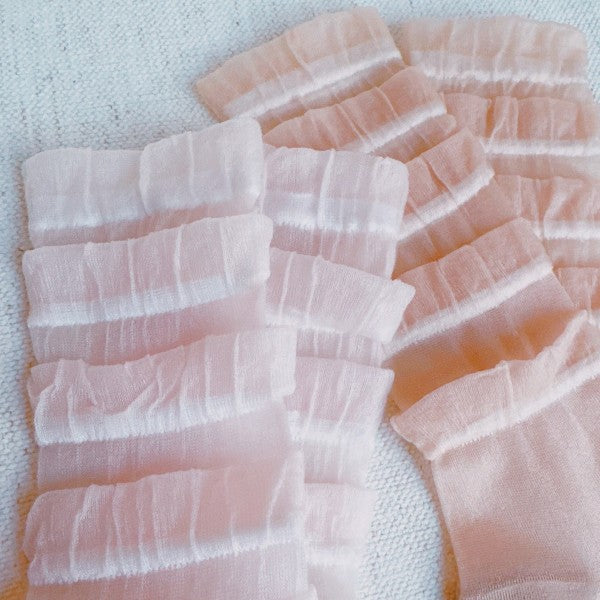 Close-up of cascading lace detail on Tulle Lace Cascade Socks, showing soft layered texture.
