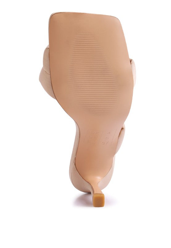 Bottom sole view of cream Spice Up Cross Strap Heels with grip texture