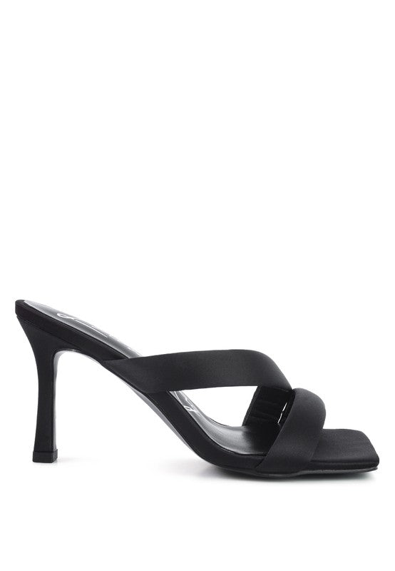 Side profile of black Spice Up Cross Strap Heels with slim high heel