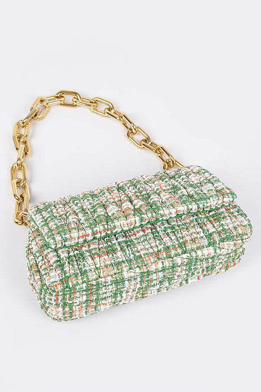 Bottom of green Madeline Quilted Tweed Shoulder Bag showing flat base design.