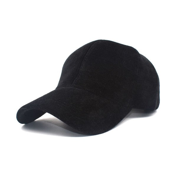 Black velour ball cap close up, velour texture, curved brim, structured design.