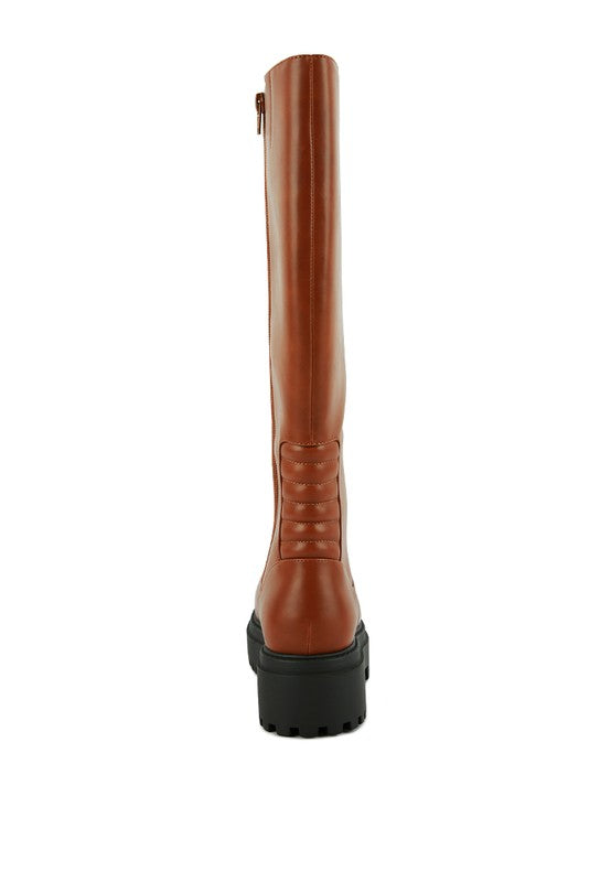Tan platform knee-high boots with a round toe, crafted from vegan leather. Featuring a zipper closure for easy wear, a 2" heel, and a durable TPR sole.
