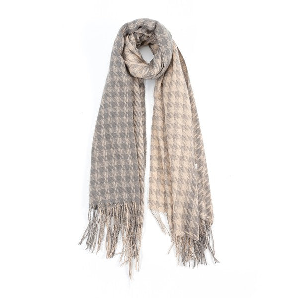 Sofiya Houndstooth Scarf in grey two-tone pattern with fringed edges, draped for a cozy fall look.