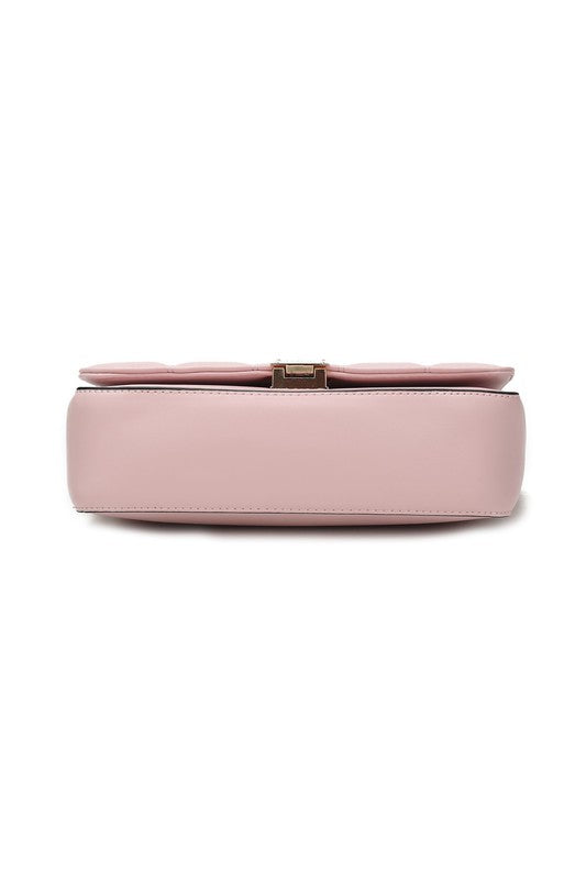 Bottom of pink Nyra Quilted Shoulder Bag with reinforced stitching.