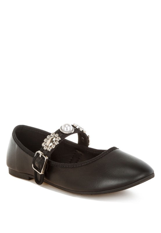 Front angled view of black Kavana Mary Jane Flats showcasing charm embellishments and round toe design.