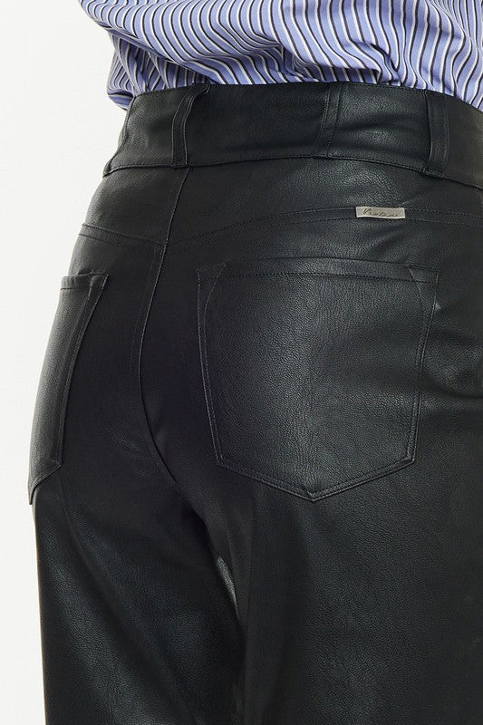 Close up of Luz Faux Leather Jeans highlighting textured faux leather finish, functional front pockets, and waist detail.