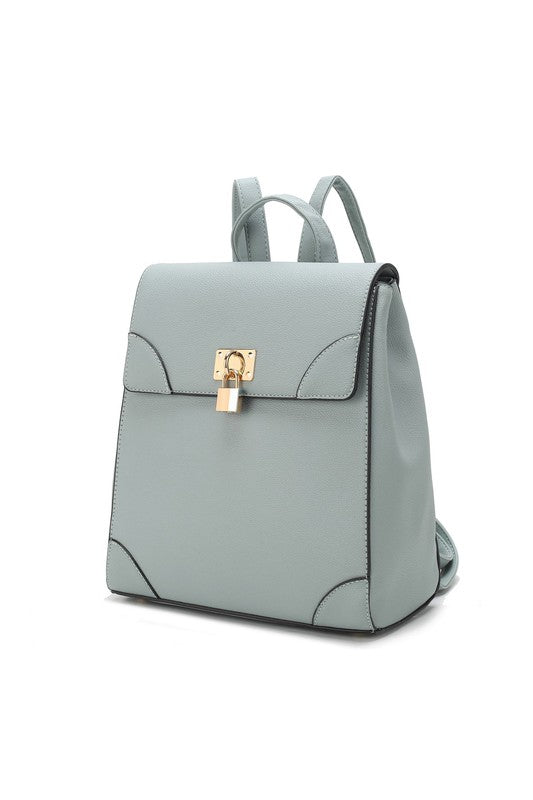 Denim Sansa backpack in textured vegan leather with magnetic snap closure.