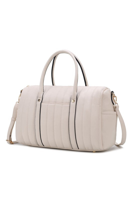 Luana Quilted Duffle Bag in Beige with gold hardware and front slip pocket.