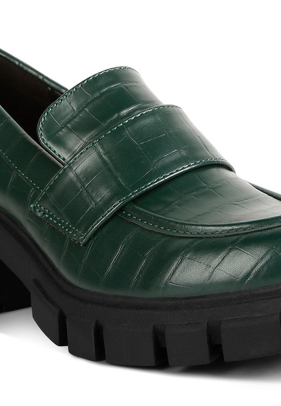 Close up of Benz Platform Loafers in dark green showing croc-embossed texture