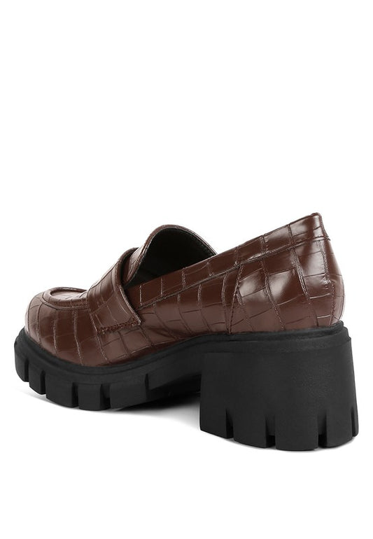 Back angle view of Benz Platform Loafers in brown with block heel detail