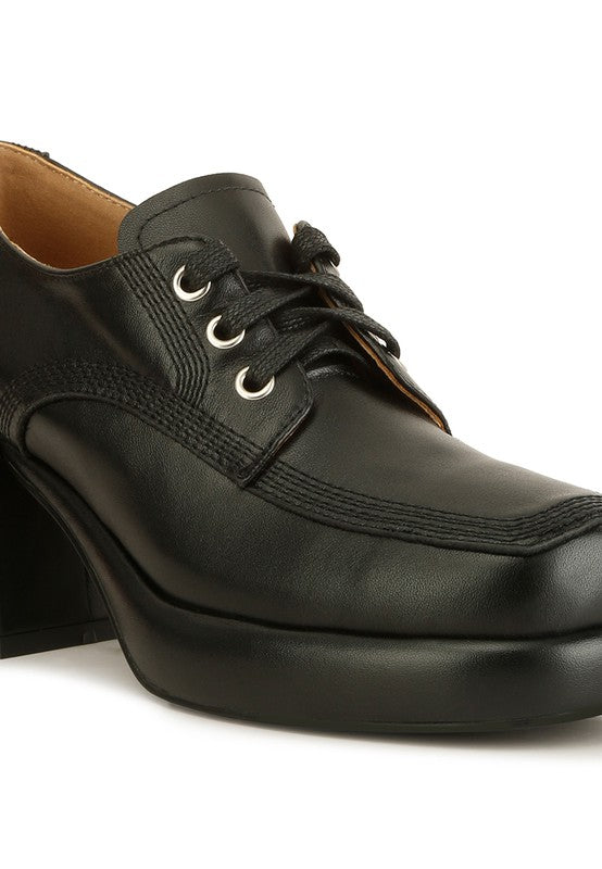 Close-up of Black Quecha Leather Block Heel Oxfords laces and stitching