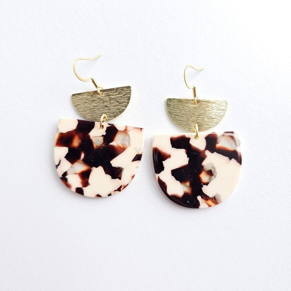 Harper Cowhide Print Earrings on white background with 18K gold-plated hooks and brushed brass accents.