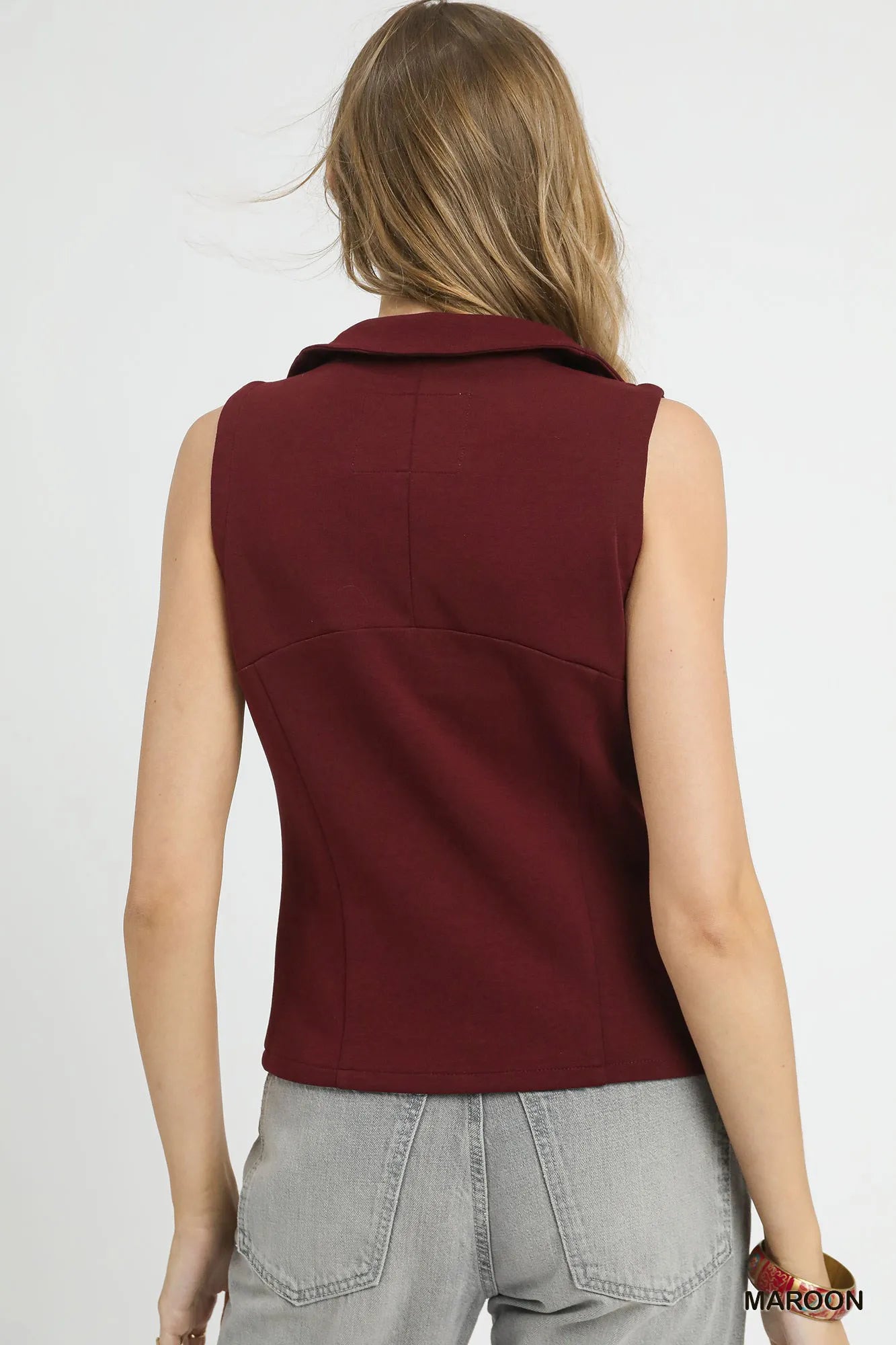 Back view of Zahra Zip-Front Fitted Vest in maroon with fitted silhouette.