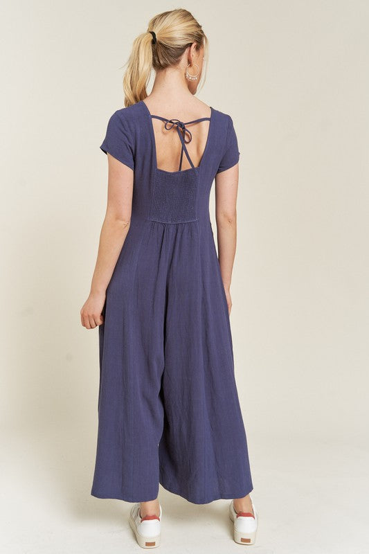 Navy Seona Linen Plus Size Jumpsuit back view with relaxed drape and short sleeves.