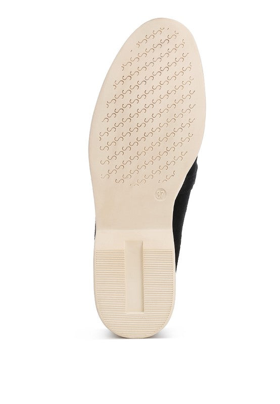 Bottom sole view of Nautica black suede loafers with TPR outsole.