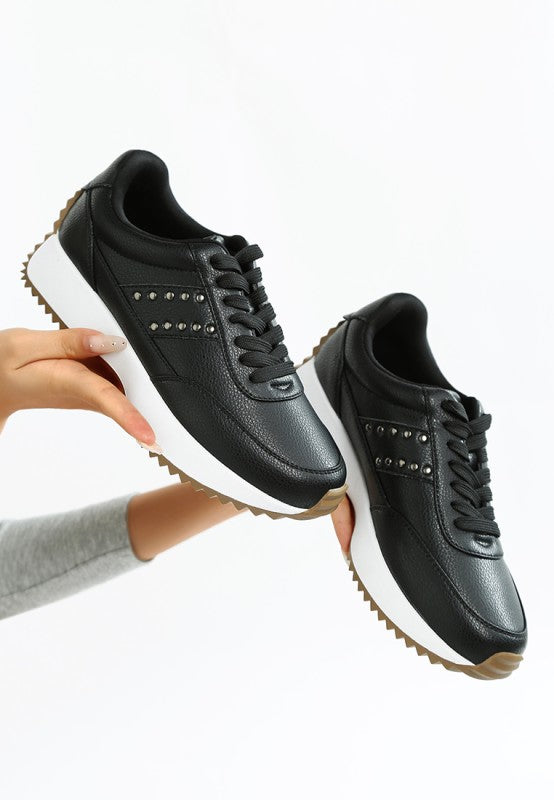 View of black Athion Studded Leather Sneakers with lace-up design and cushion insole.