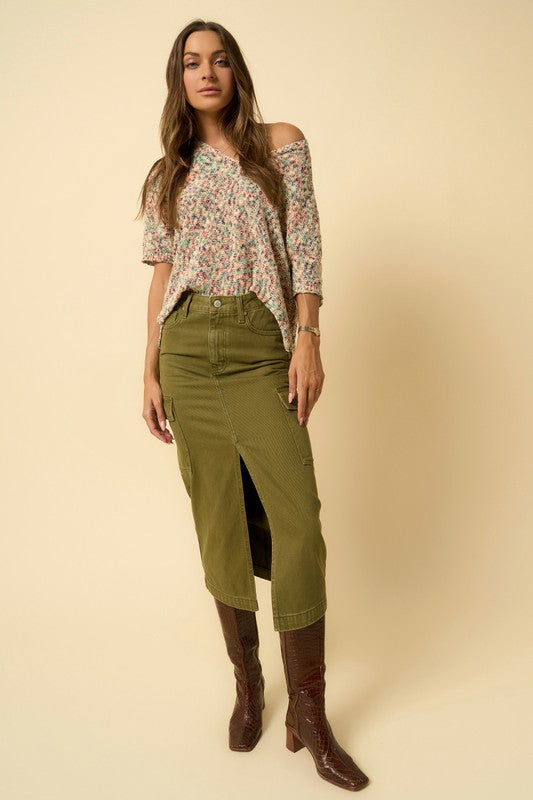 Front view of Buffy Cargo Midi Skirt in olive denim, showing button closure, pockets, and front slit.