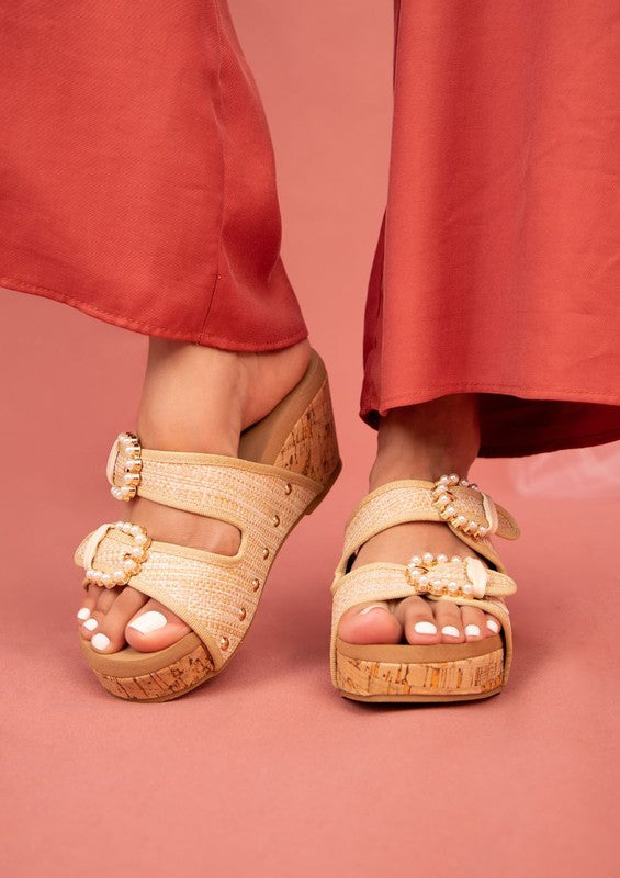 Raffia Brianna Cork Wedge Sandal with textured cork heel, open toe, and adjustable closure.
