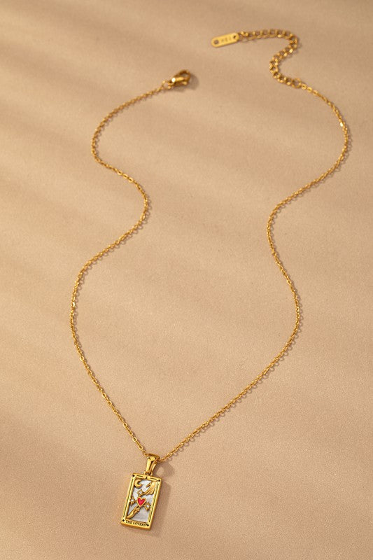 Tarot Card Star Pendant Necklace with mother of pearl background and rhinestone details on gold-tone chain.