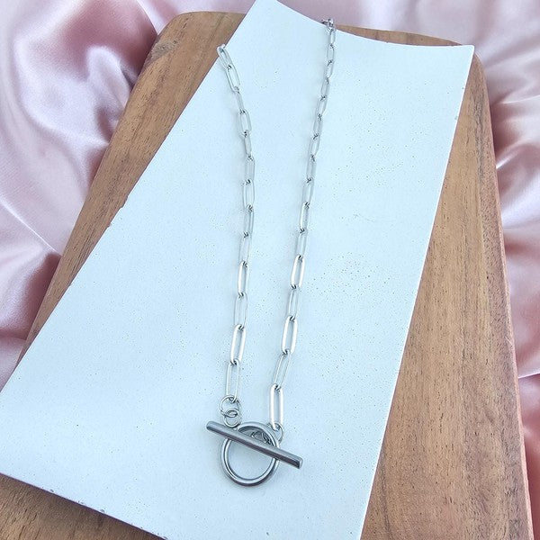 Close-up of Nissa Silver Paperclip Chain toggle clasp, stainless steel, PVD finish, versatile wear front or back.