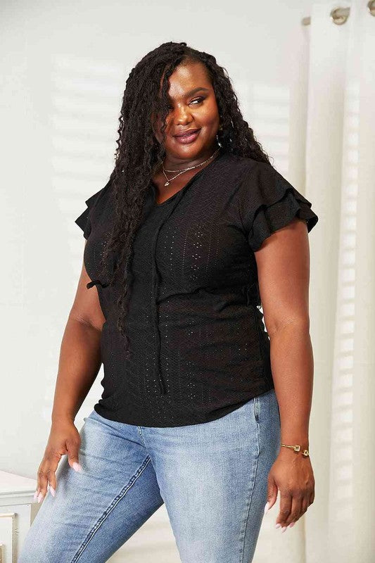 Plus size Tami Eyelet Tie-Neck Top in black with flutter sleeves and a casual, flattering fit.