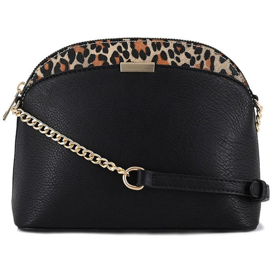 Black Leopard Accent Crossbody Bag, small dome silhouette with leopard trim, gold chain strap, zip closure, and exterior slip pockets.