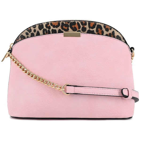 Pink Leopard Accent Crossbody Bag with leopard accent, gold chain strap, top zip, and compact interior.