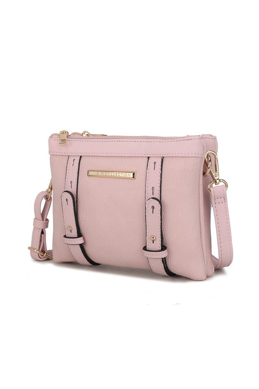 Front view of blush Elsie crossbody bag with gold hardware and zip closure.