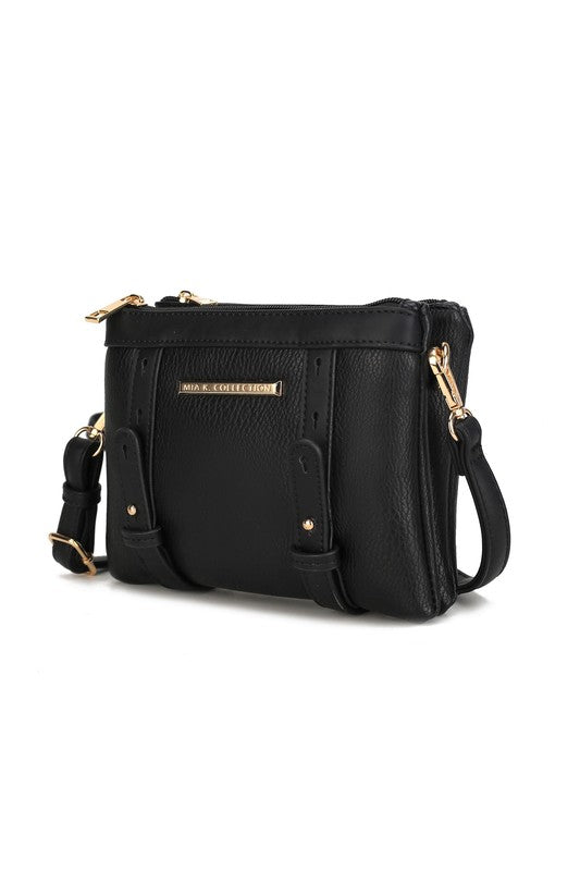 Front view of black Elsie crossbody bag with gold hardware and zip closure.