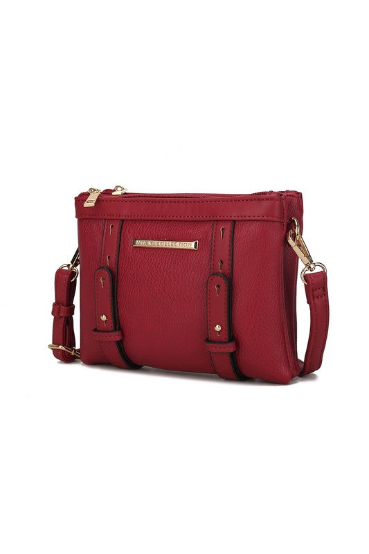Front view of red Elsie crossbody bag with gold hardware and zip closure.