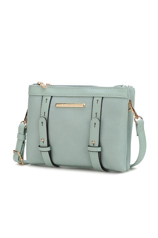 Front view of seafoam Elsie crossbody bag with gold hardware and zip closure.