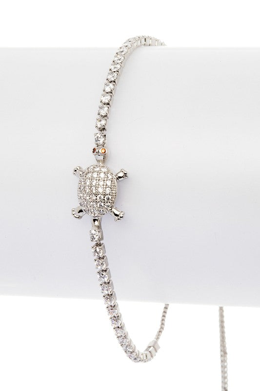 Silver turtle pavé string bracelet with cubic zirconia accents, highlighting the detailed pavé shell.