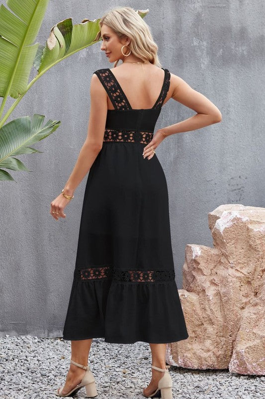 Back view of Tory Midi Dress in black, sleeveless with zipper closure and clean midi silhouette.